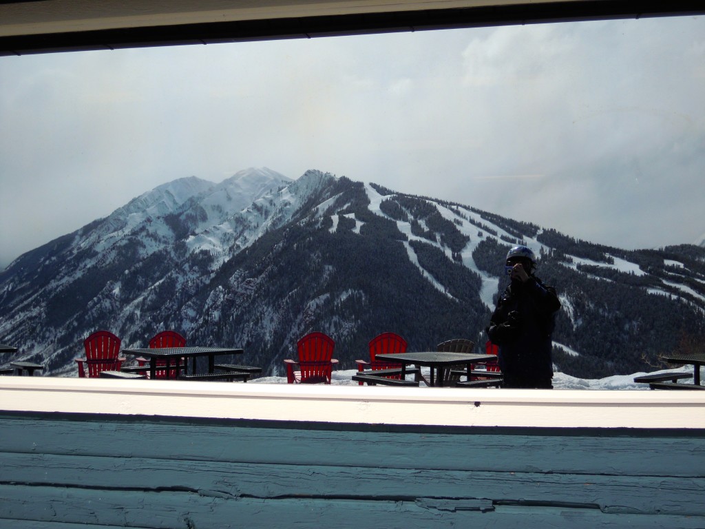 Aspen Highlands reflected in window of Aspen Buttermilk restaurant